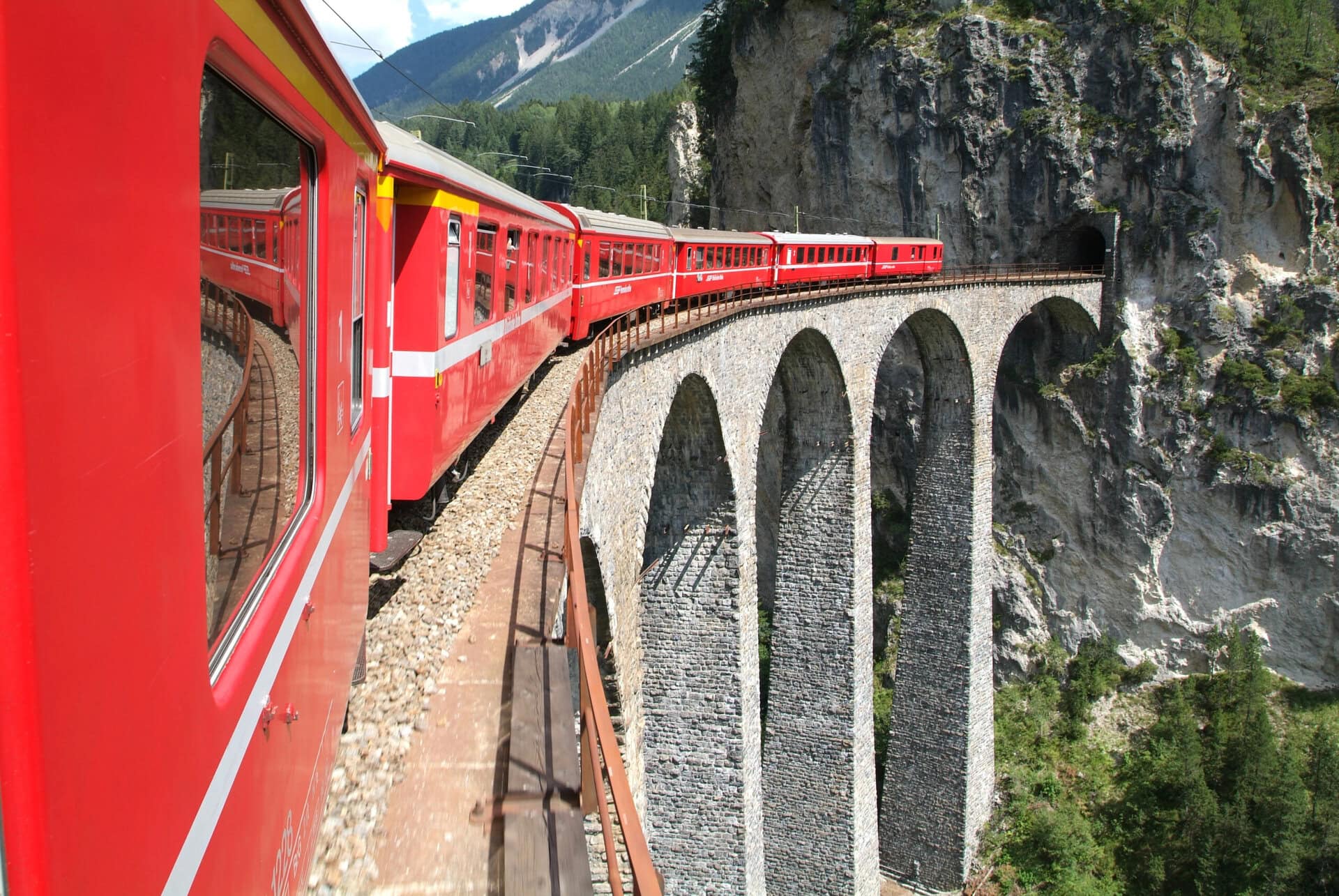 The train of Bernina Express on the Swiss alps